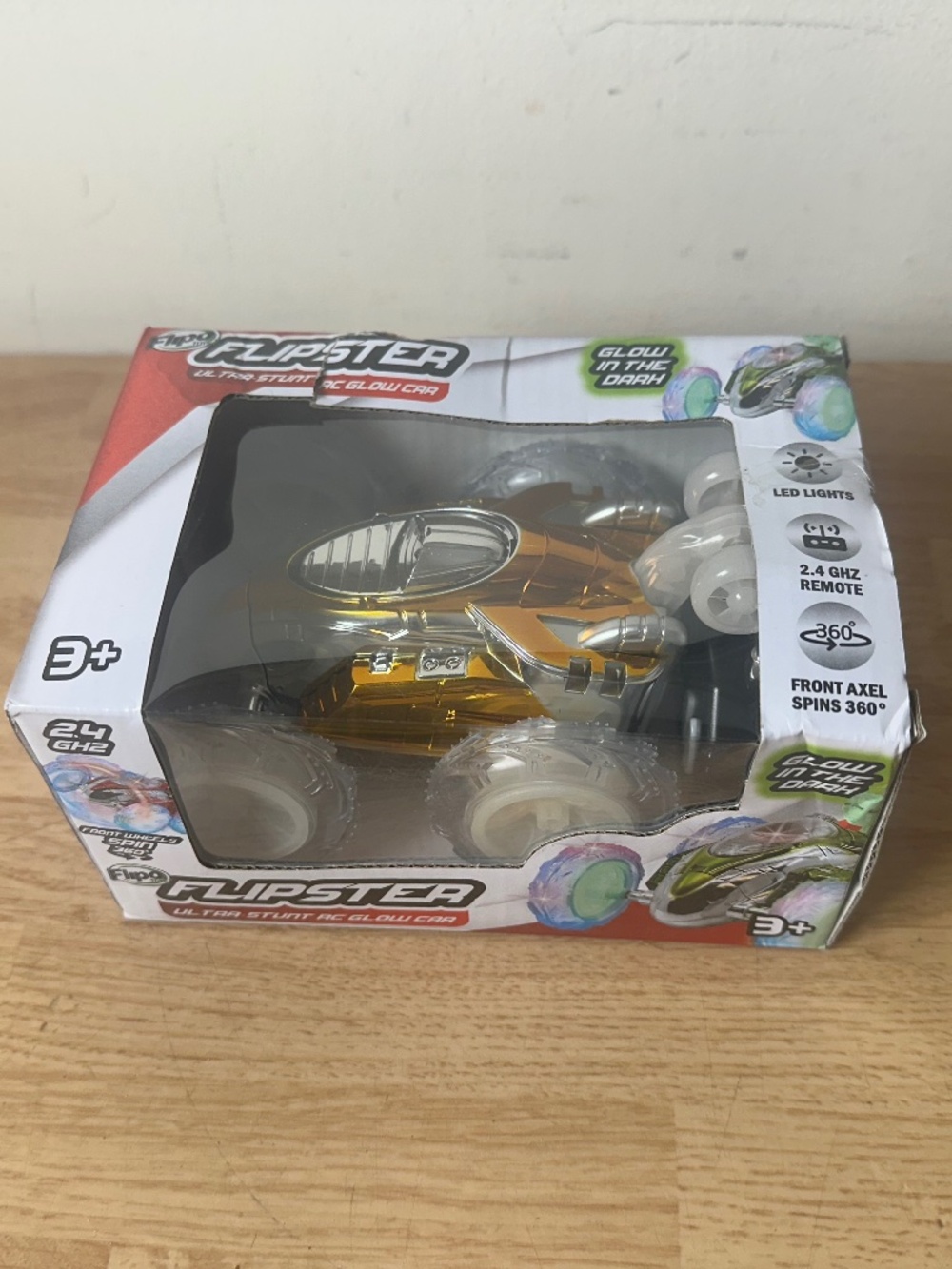 FLIPO FLIPSTER ULTRA-STUNT 2.4GHZ RC GLOW IN THE DARK CAR - GOLD - NEW IN BOX!